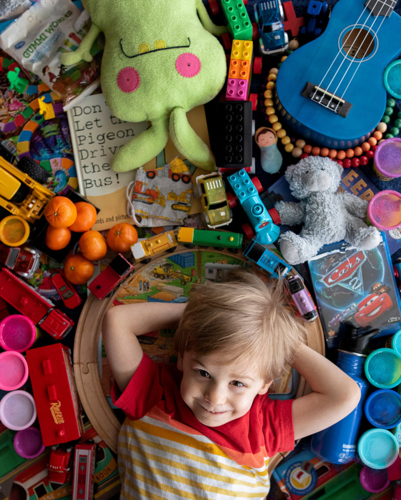 Color Theory child with rainbow toys