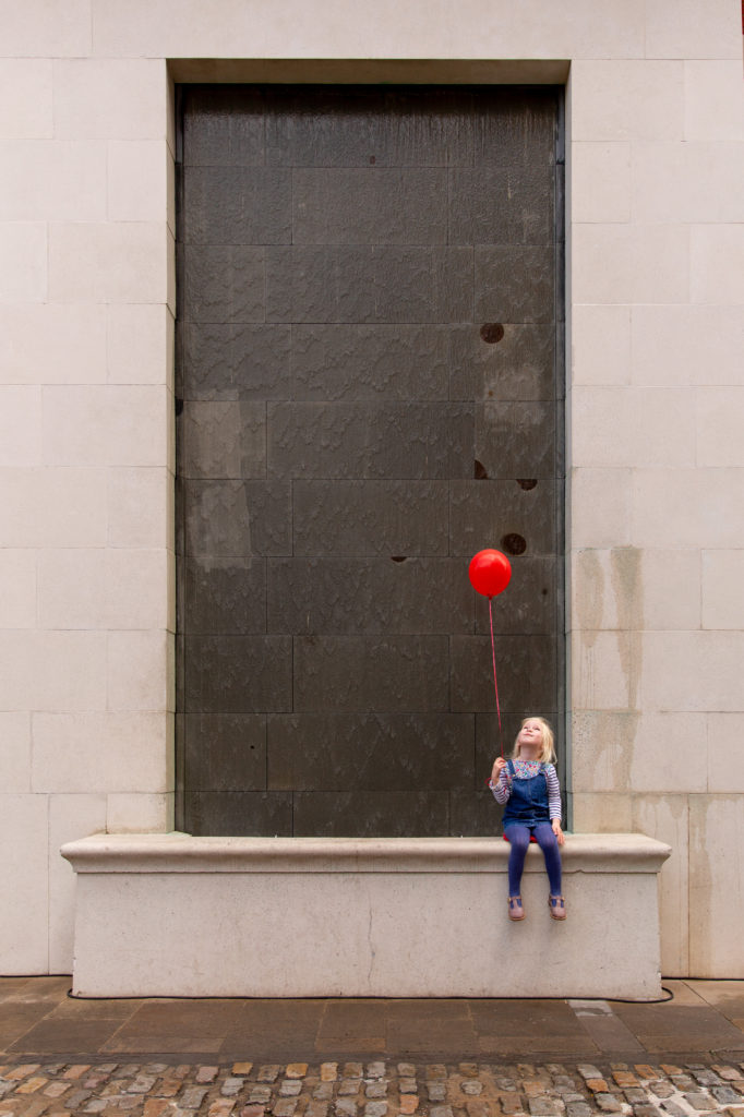 Negative Space in Photography - Child with Balloon