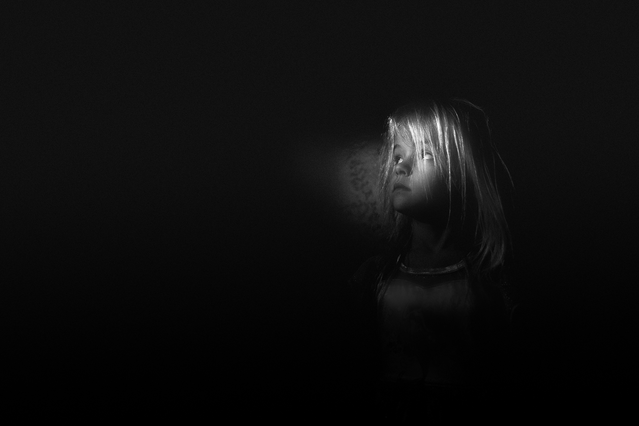 Girl in a dark corner