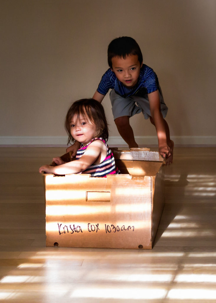 Children playing in box