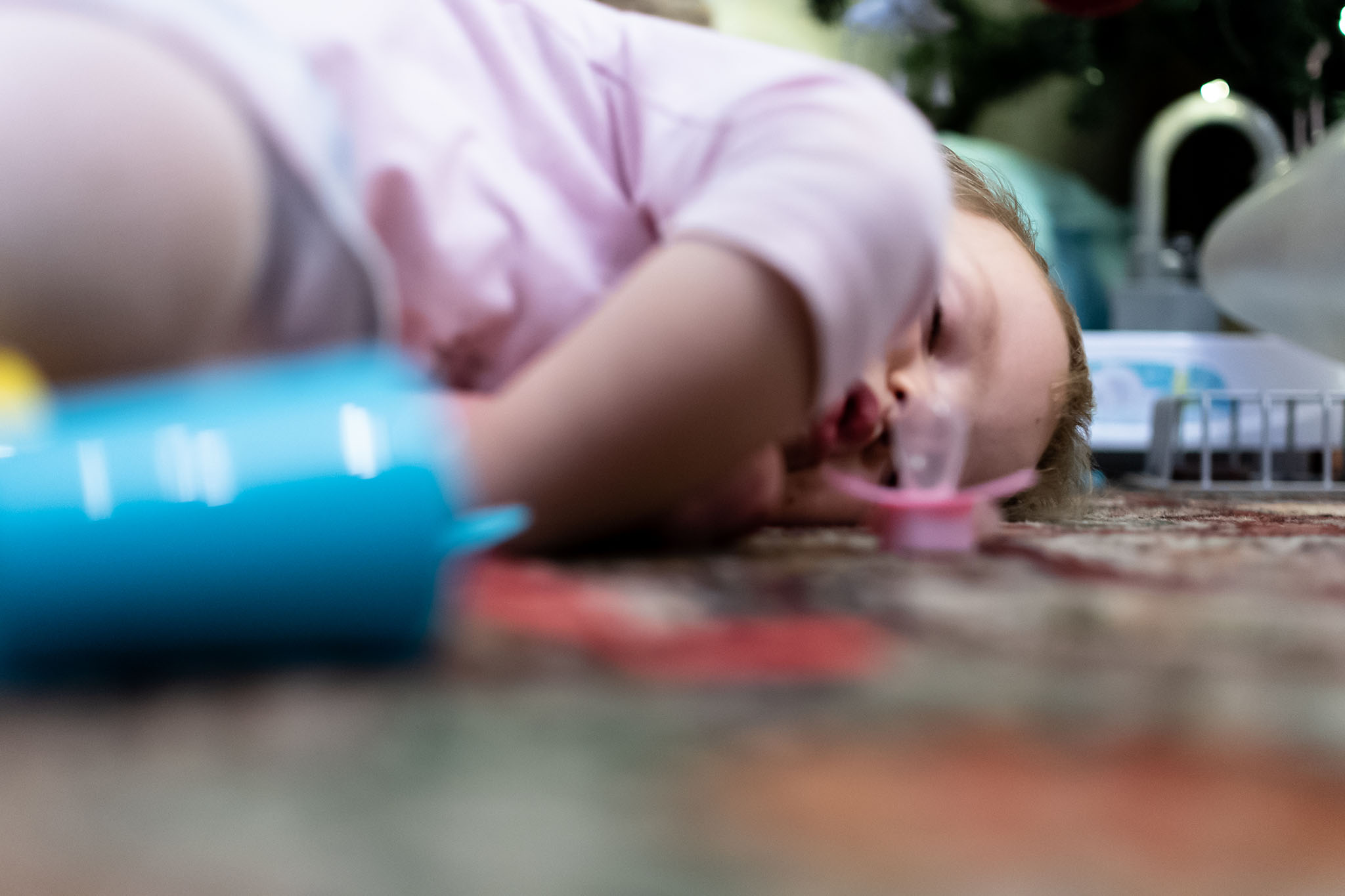 Close up of child on floor
