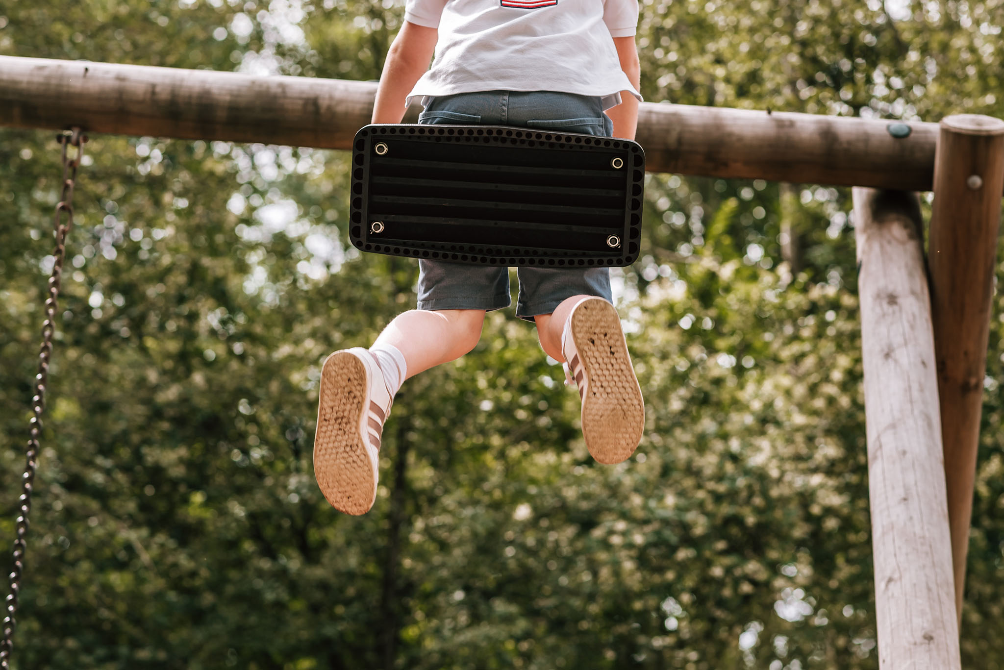 Why Back Button Focus (BBF) is my BFF - Child on swing from below