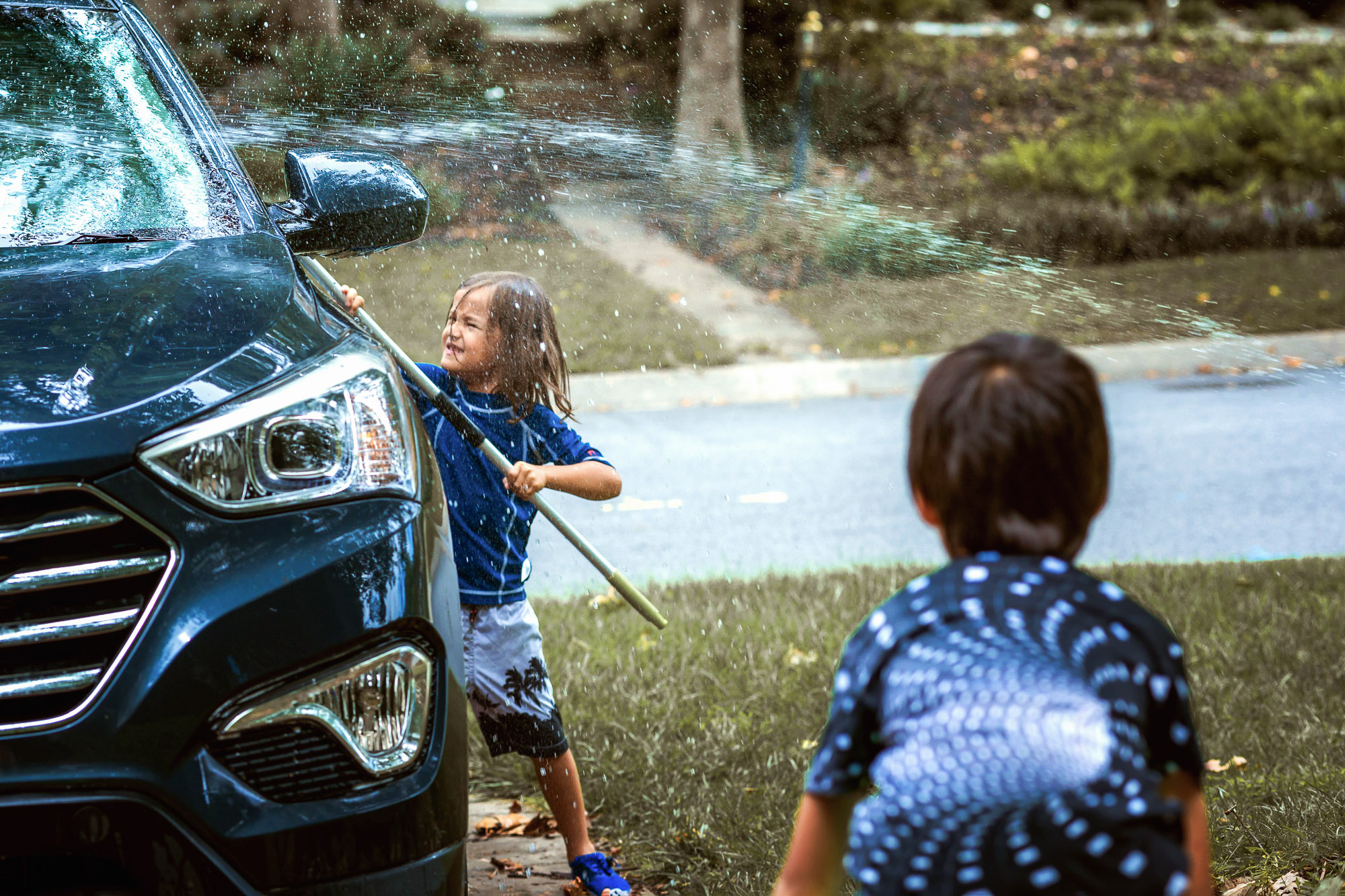 Children washing a car