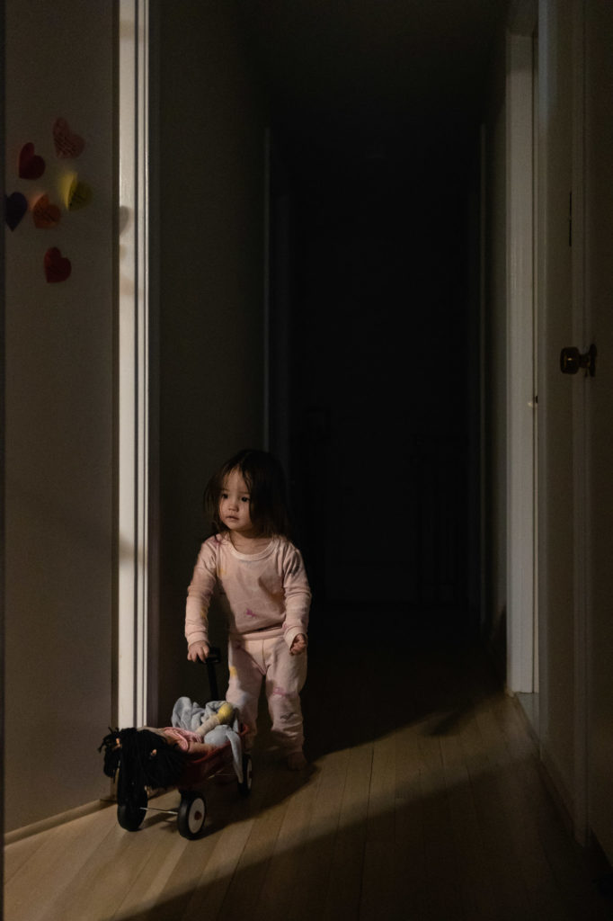 Child playing in hallway