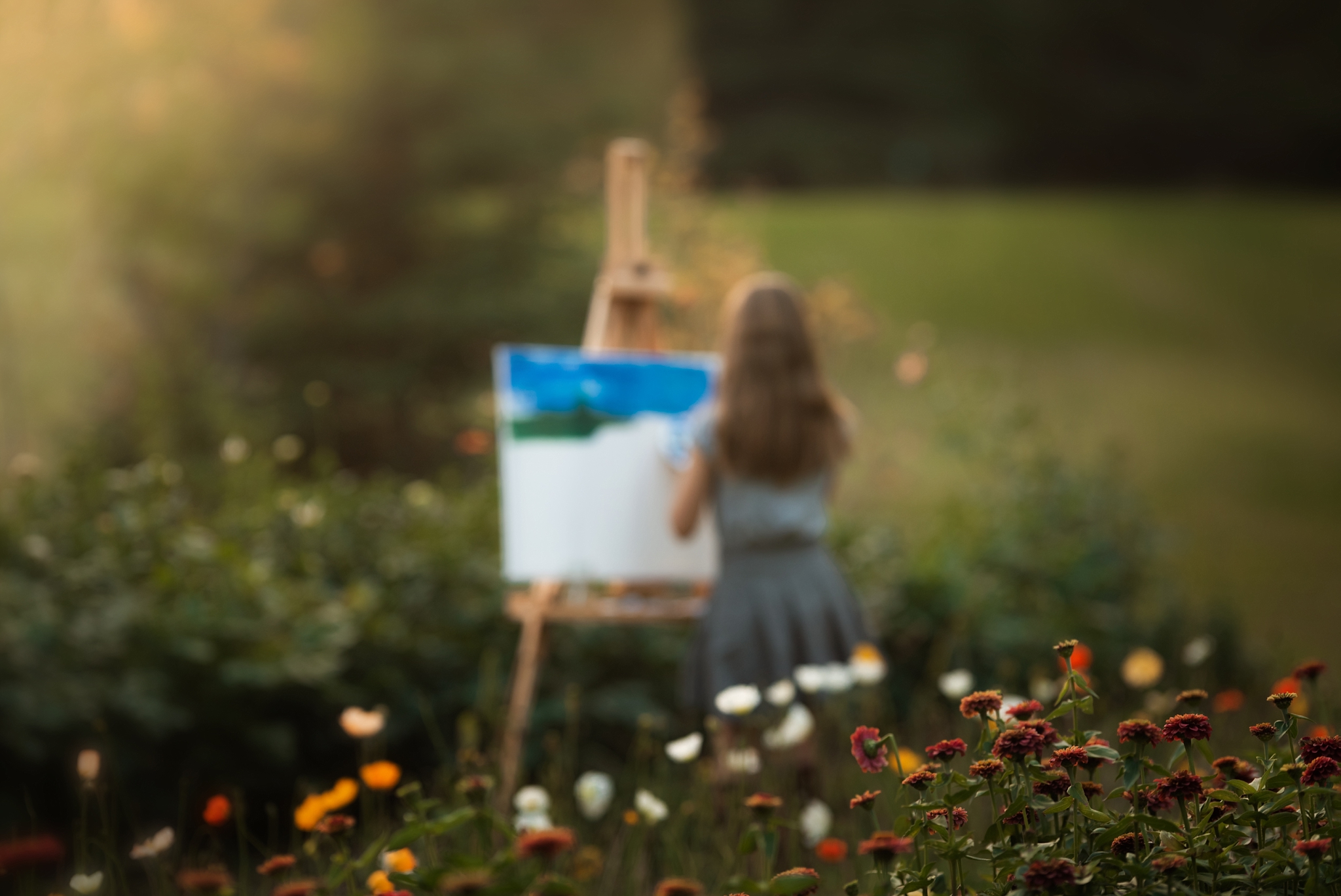From backyard to dream location - girl outdoors painting