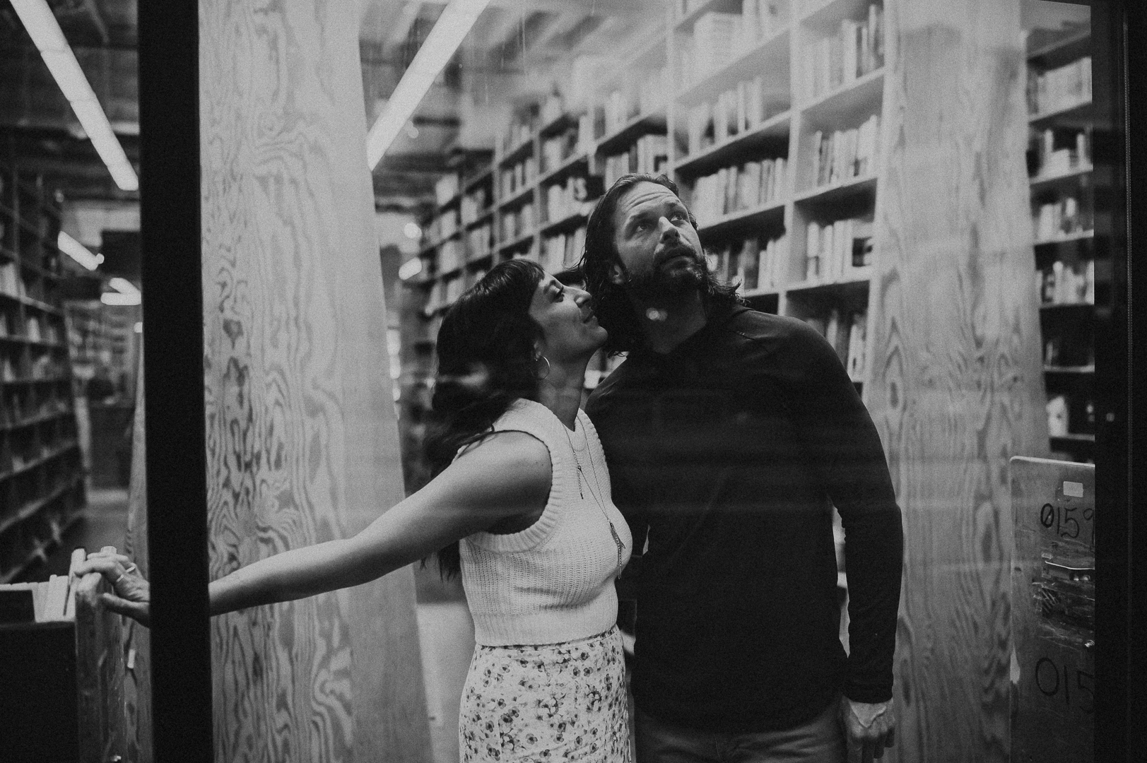Nighttime couples session - couple in bookstore