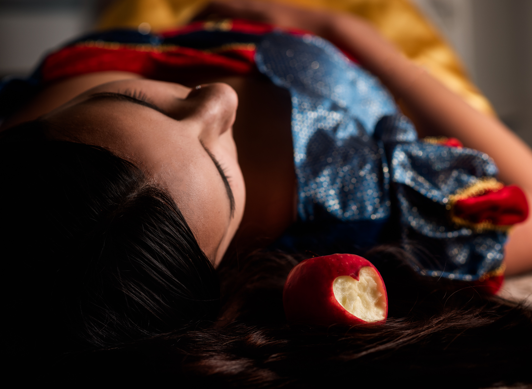 Girl laying with an apple