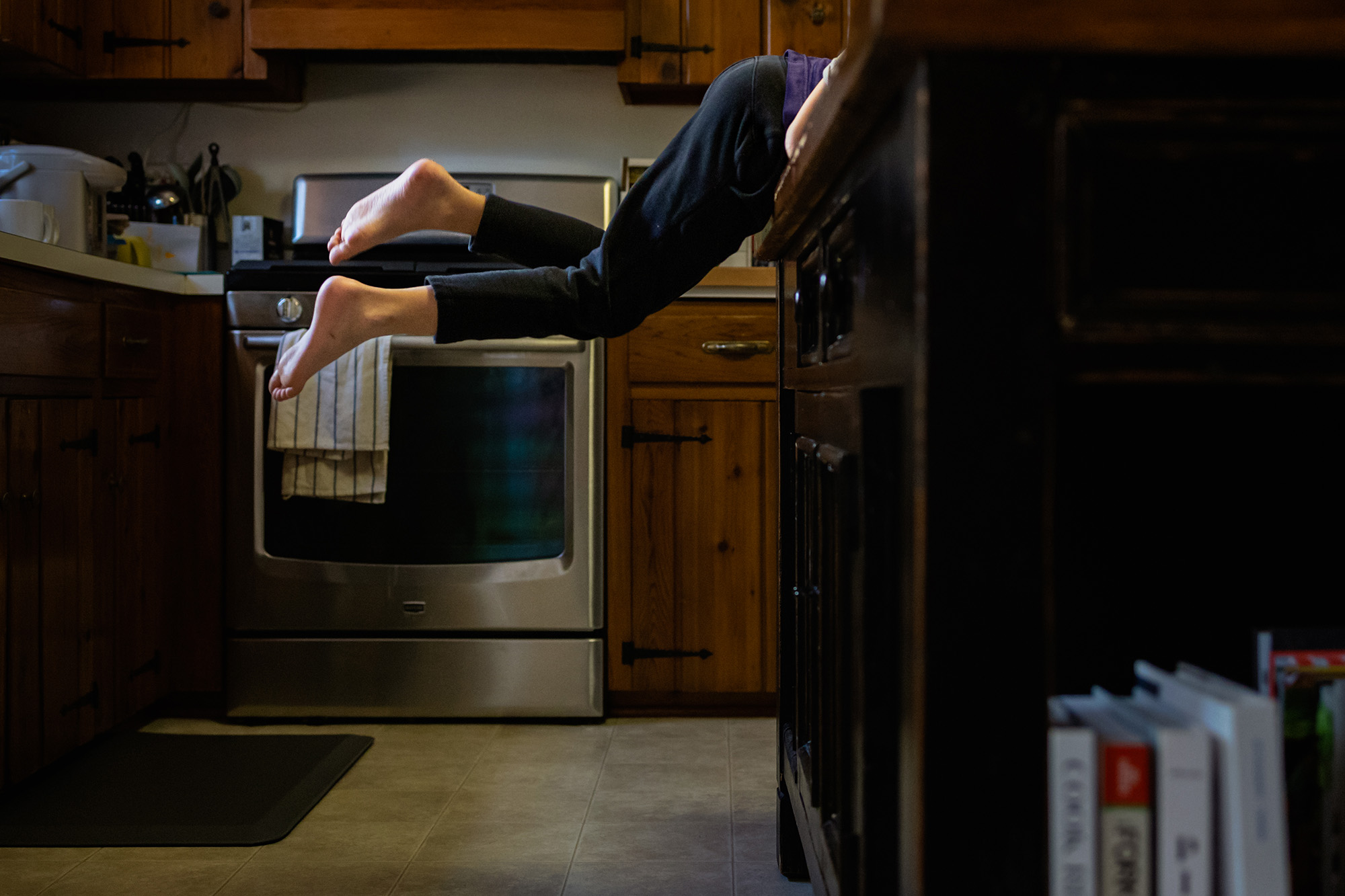 Finding Inspiration Indoors: Child climbing on counter