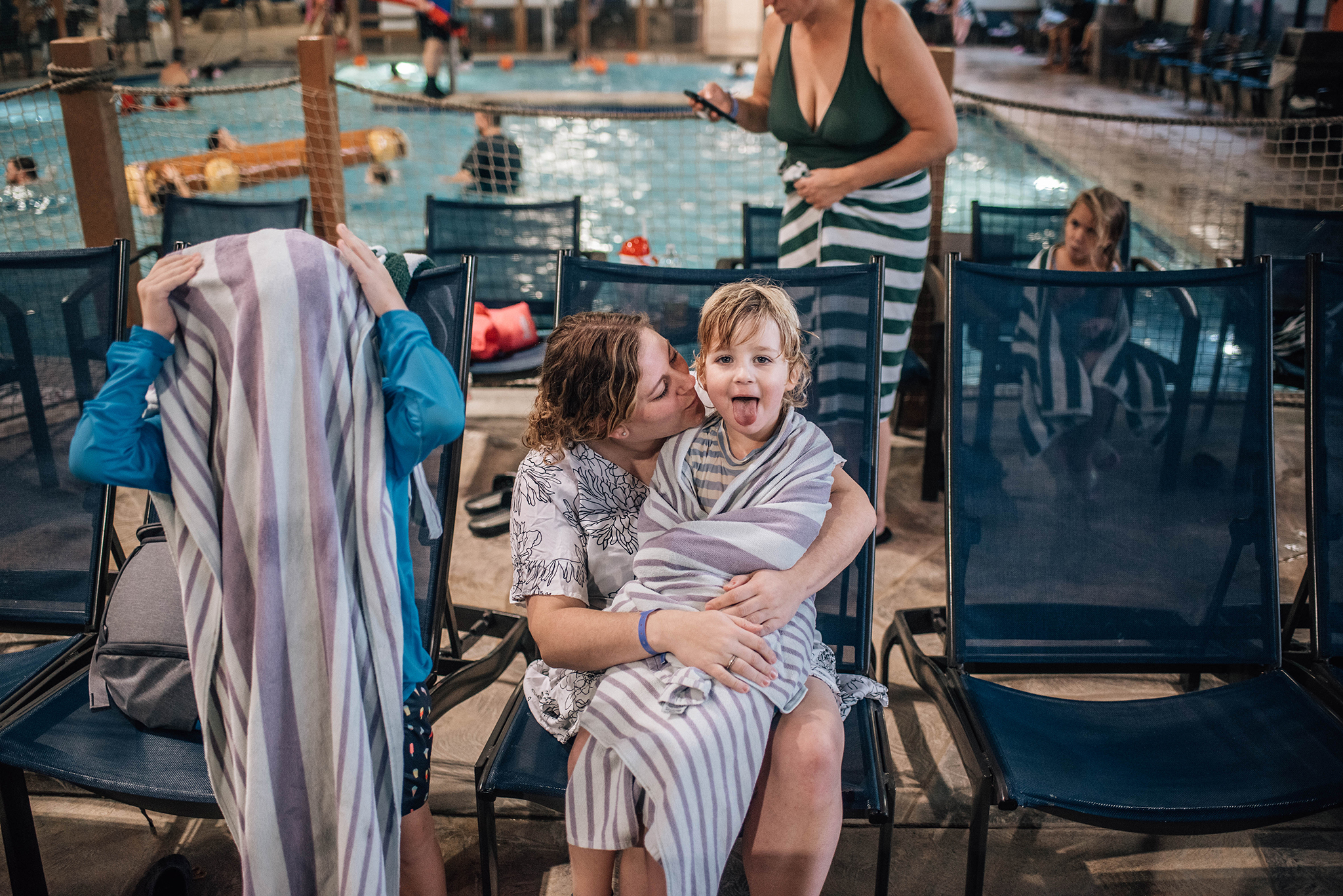 Child with mom at indoor water park