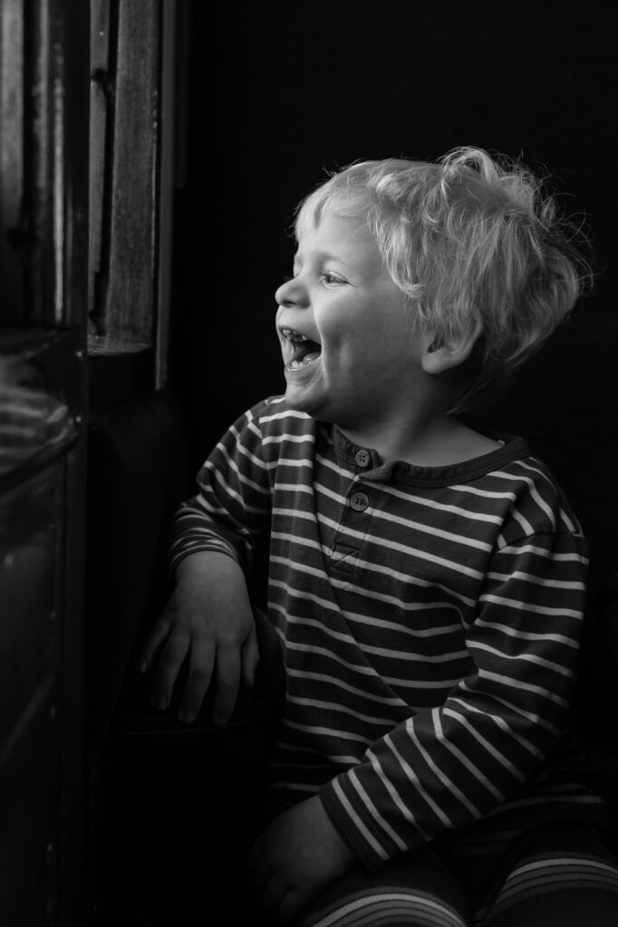 Black and white portrait of little boy