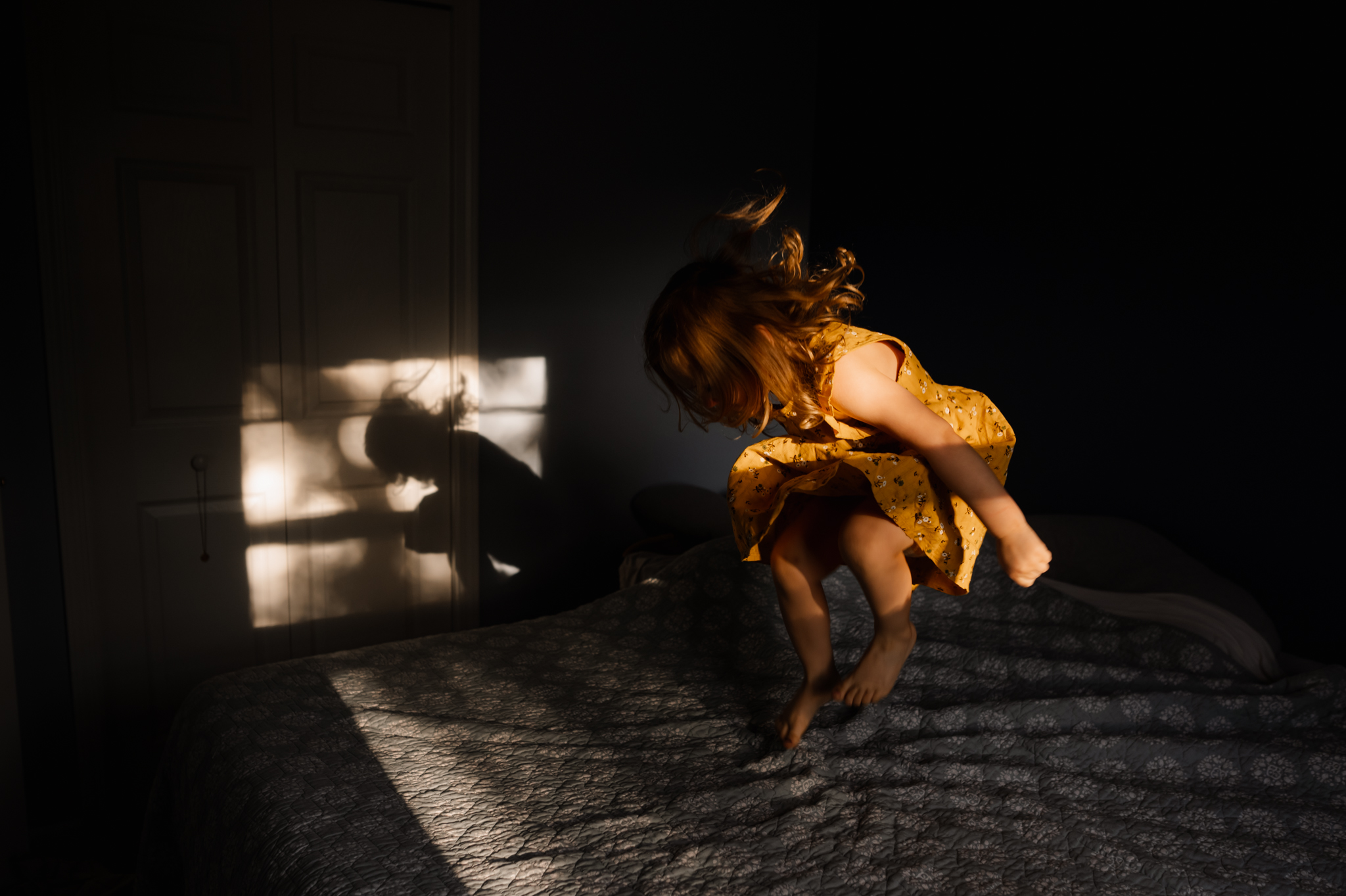 5 Spots in Your House to Capture Low Light Images - girl jumping on bed