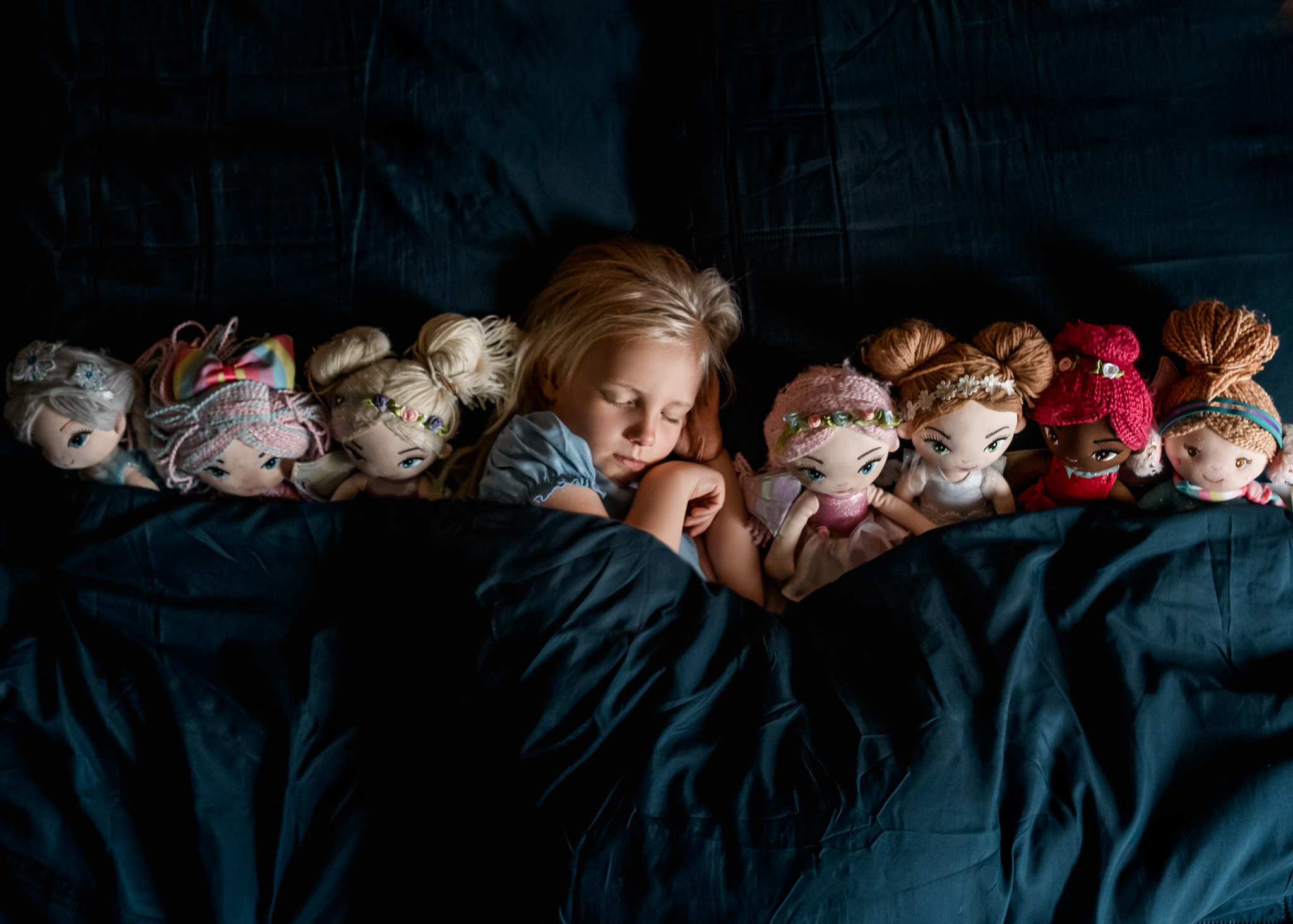 Beautiful Photos in Renovation Chaos - little girl sleeping with dolls