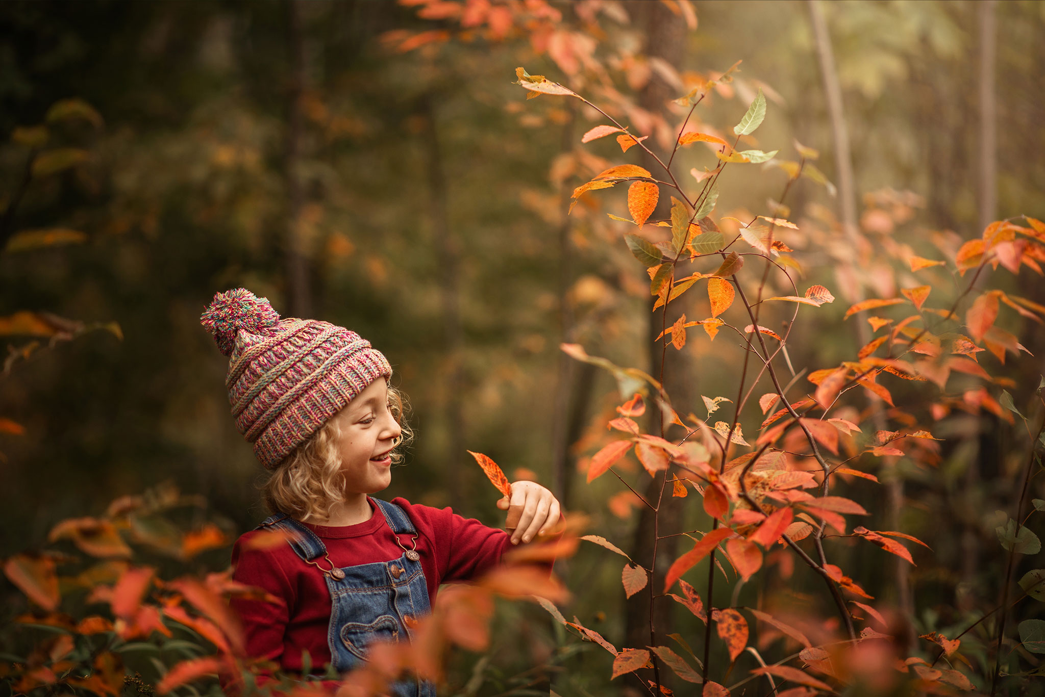 Child picking leaves
