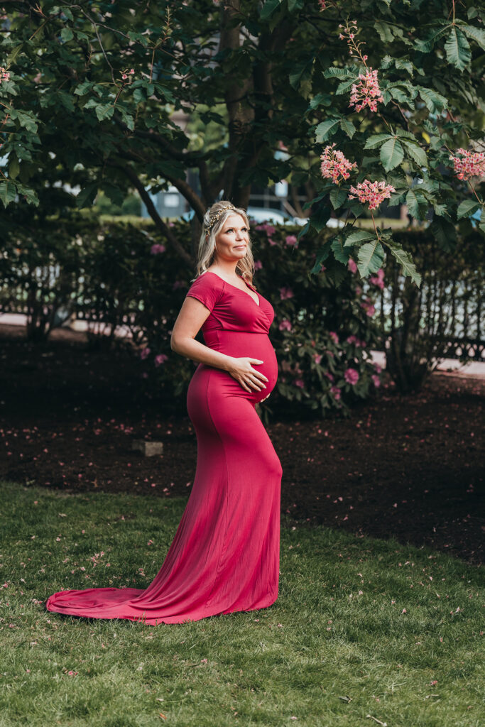 Bumping into Perfection - pregnant woman in red dress